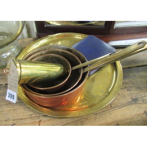 399 - THREE GRADUATED COPPER PANS AND A BRASS PLATE ETC