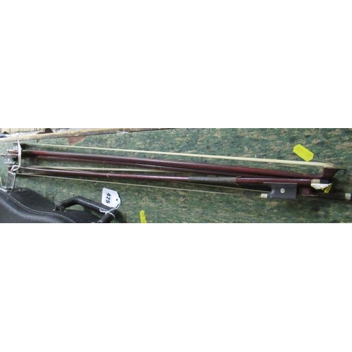 424A - FOUR VIOLIN BOWS