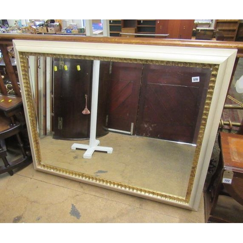 570 - LARGE CREAM AND GILT FRAMED MIRROR