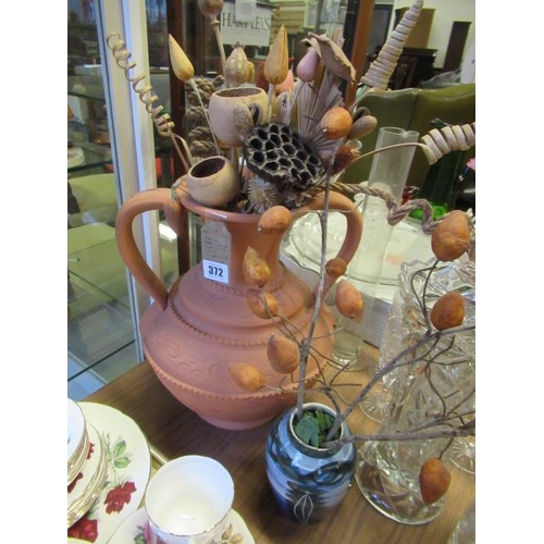 372 - LARGE TERRACOTTA VASE WITH FAUX FLOWERS AND ANOTHER