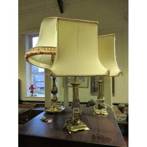 439 - THREE BRASS TABLE LAMPS