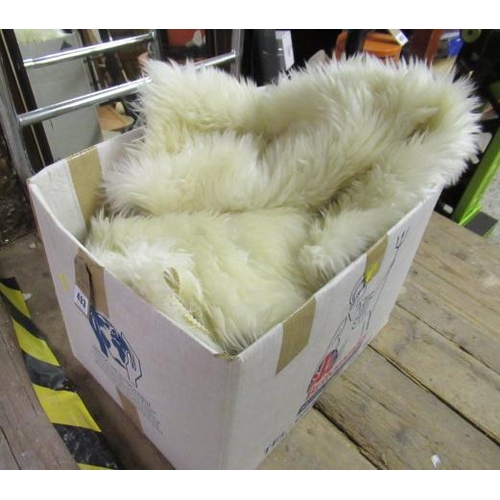 493 - THREE FAUX SHEEPSKIN RUGS