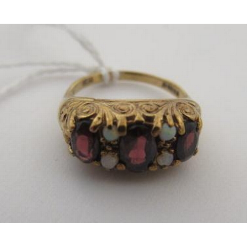 183 - 9CT GOLD GARNET AND OPAL BEAD RING