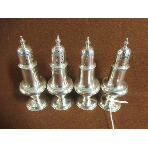 244 - SET OF THREE AND ONE SILVER PEPPERETTES