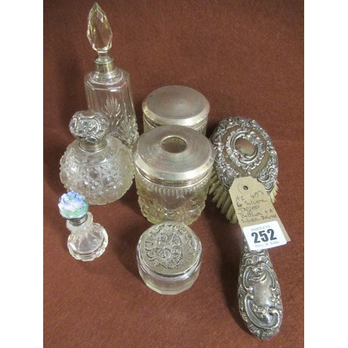 252 - SIX SILVER TOP BOTTLES AND SILVER BRUSH