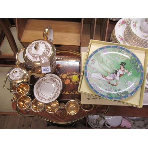 382 - TWO MARQUETRY TRAYS AND A CAPO DI MONTE COFFEE SET