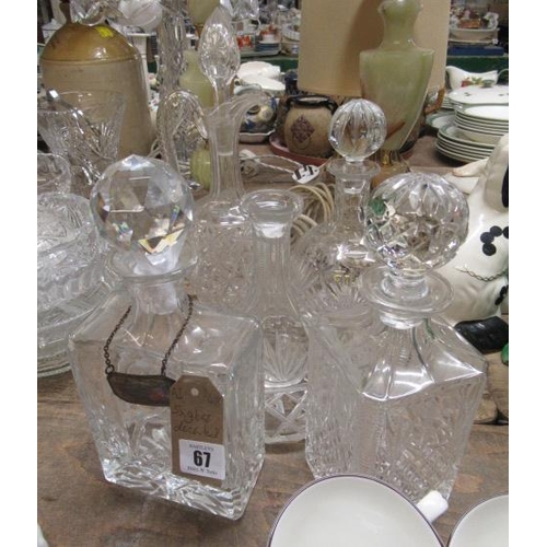 67 - FIVE GLASS DECANTERS