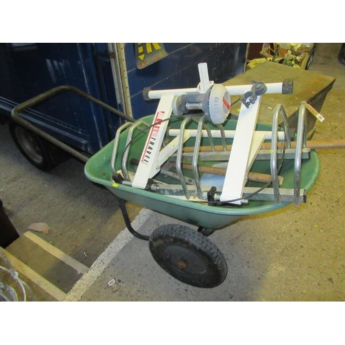 556 - WHEELBARROW AND CONTENTS