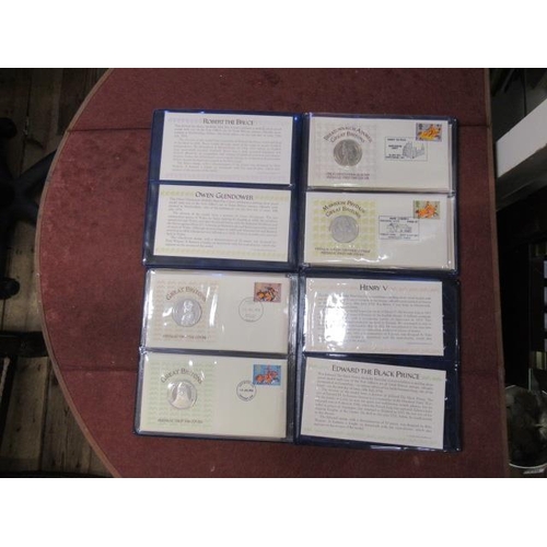 704 - TWO SETS OF CASED GB FIRST DAY COVERS CONTAINING EIGHT SILVER MEDALLIONS