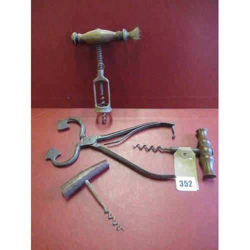 352 - THREE CORK SCREWS AND A PAIR OF SUGAR NIPS