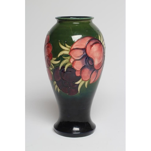 107 - A LARGE MOORCROFT POTTERY ANEMONE VASE, modern, of inverted baluster form, painted in typical palett... 