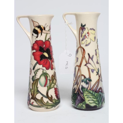 111 - TWO MOORCROFT POTTERY EWERS of tapering cylindrical form, comprising RHS Lemon Sorbet, 2020, number ... 