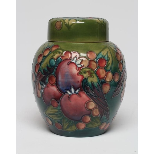 117 - A MOORCROFT POTTERY FINCHES JAR AND COVER, 1991, painted in typical colours designed by Sally Tuffin... 