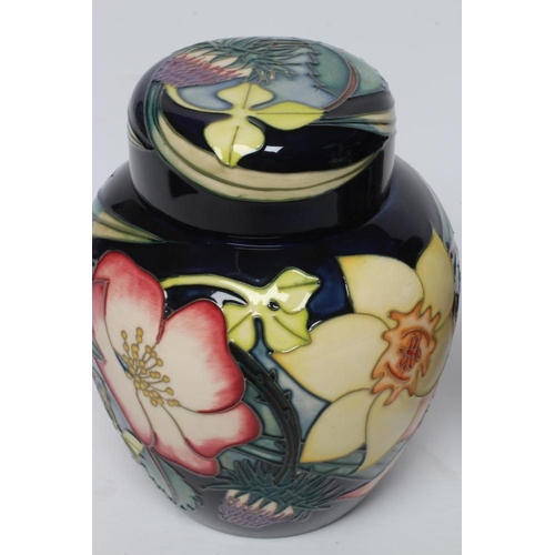 118 - TWO MOORCROFT POTTERY JARS AND COVERS, comprising Golden Jubilee designed by Emma Bossons, 2001, and... 