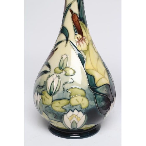 121 - A MOORCROFT POTTERY VASE, 1996, of swept baluster form, painted with the Lamia pattern designed by R... 