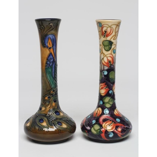 122 - A MOORCROFT POTTERY BOTTLE VASE, 1997, painted in colours with the Phoenix Peacock Feather pattern d... 