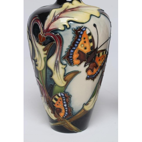 123 - A MOORCROFT POTTERY VASE, 2006, of flared rounded cylindrical form, painted in colours with the Aval... 