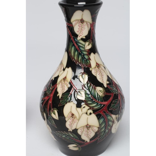 123 - A MOORCROFT POTTERY VASE, 2006, of flared rounded cylindrical form, painted in colours with the Aval... 