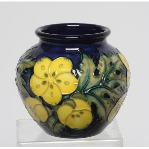 124 - FIVE MOORCROFT POTTERY VASES, comprising a Buttercup small vase, 1992, of rounded cylindrical form, ... 