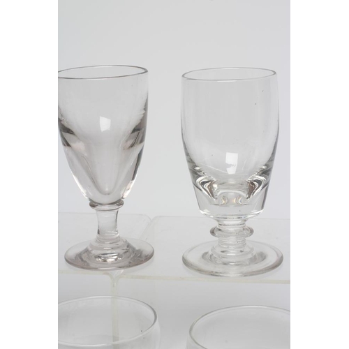 145 - A PAIR OF GEORGIAN GLASS RUMMERS, the semi-panelled bowls engraved with initials, on a facet blade k... 