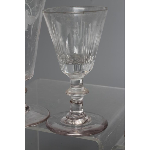 149 - A COLLECTION OF SEVEN GLASS FLUTES, late 18th century and later, including one with wrythen fluted b... 