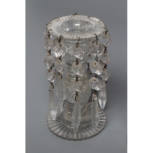 153 - A SMALL PAIR OF REGENCY GLASS LUSTRES, the slice cut everted rims hung with faceted drops with spire... 