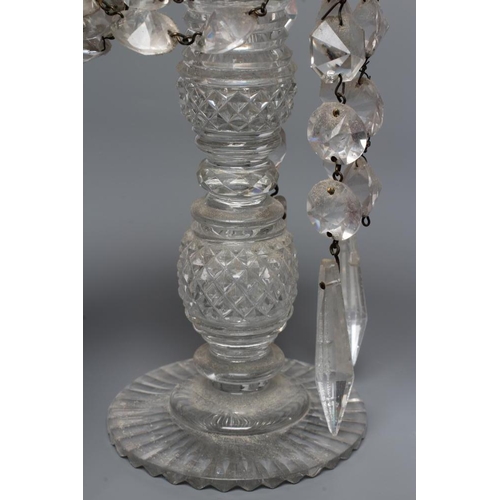 153 - A SMALL PAIR OF REGENCY GLASS LUSTRES, the slice cut everted rims hung with faceted drops with spire... 