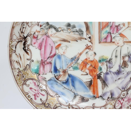 2 - A CHINESE PORCELAIN SAUCER centrally painted in coloured enamels with a boy seated at a window overl... 