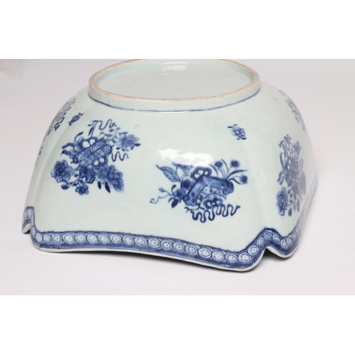 4 - A CHINESE PORCELAIN BOWL of lobed square form painted in underglaze blue with precious objects below... 