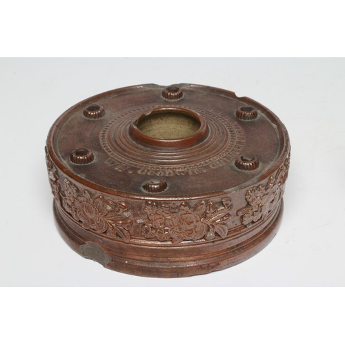 47 - A DOCUMENTARY BROWN SALTGLAZE STONEWARE CIRCULAR INKWELL, 1861, the central cylindrical well with ri... 