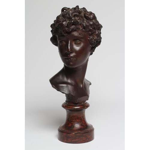 550 - AFTER DENYS PIERRE PUECH (1854-1942) Jeune Romaine, bronze effect bust, bears signature, 16