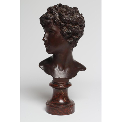 550 - AFTER DENYS PIERRE PUECH (1854-1942) Jeune Romaine, bronze effect bust, bears signature, 16