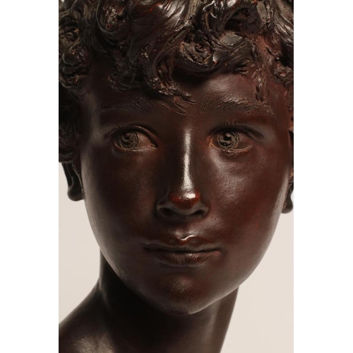 550 - AFTER DENYS PIERRE PUECH (1854-1942) Jeune Romaine, bronze effect bust, bears signature, 16