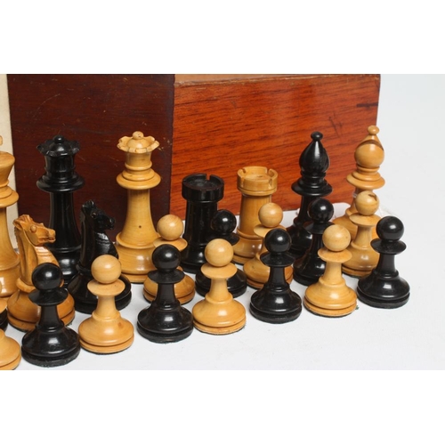 557 - A BOX AND EBONY STAUNTON PATTERN CHESS SET, unmarked, king 3 1/4