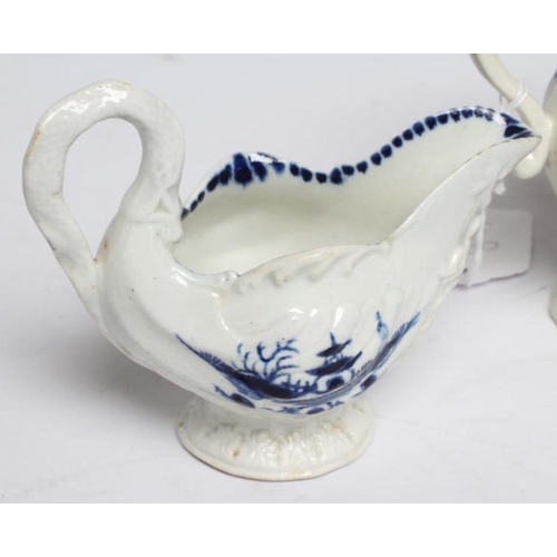 61 - A PENNINGTON'S PORCELAIN SHELL MOULDED BUTTER BOAT, c.1780's, with biting snake handle, painted in u... 