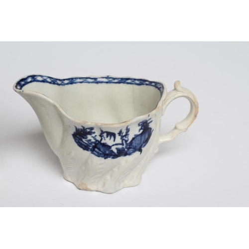 61 - A PENNINGTON'S PORCELAIN SHELL MOULDED BUTTER BOAT, c.1780's, with biting snake handle, painted in u... 