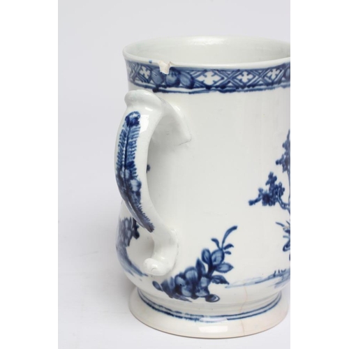 63 - A VAUXHALL PORCELAIN MUG, 1755-60, of baluster form painted in underglaze blue with a small child st... 