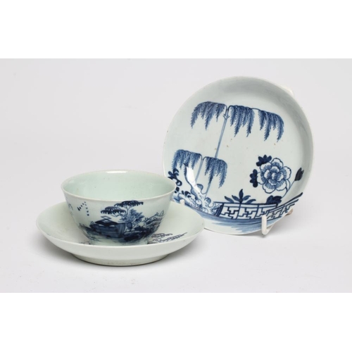 72 - A CHAFFERS PORCELAIN TEA BOWL AND SAUCER, 1760-65, painted in underglaze blue with the Long Bridge p... 