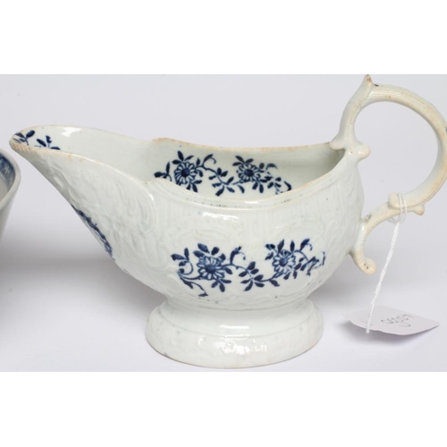 73 - A JOHN PENNINGTON PORCELAIN SAUCEBOAT, c.1780's, of pleat moulded shaped oval form, printed in under... 