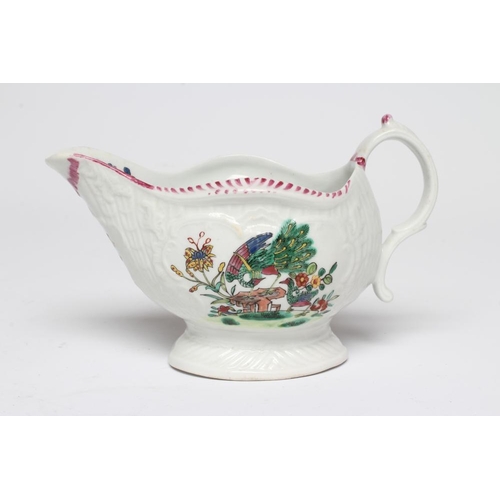 86 - A CHRISTIANS PORCELAIN SAUCE BOAT, 1770-78, of lobed oval pleat and floral moulded form, painted in ... 