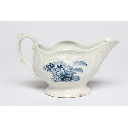 87 - A CHRISTIANS PORCELAIN SAUCE BOAT, 1768-78, of lobed oval form moulded with columns and over lapping... 