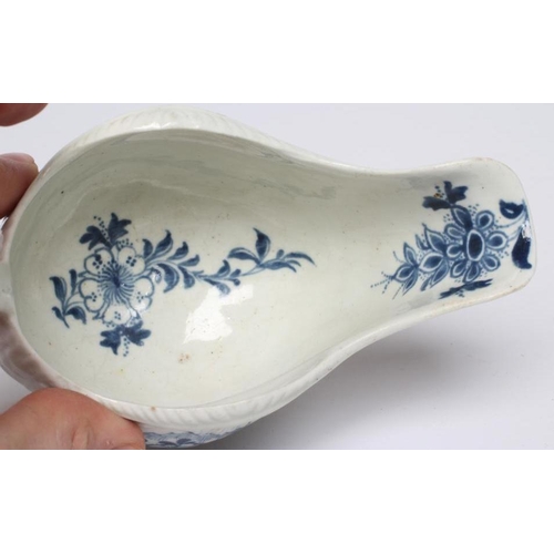 87 - A CHRISTIANS PORCELAIN SAUCE BOAT, 1768-78, of lobed oval form moulded with columns and over lapping... 