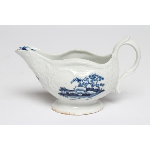 88 - A CHRISTIANS PORCELAIN SAUCE BOAT, 1768-78, smaller but similar to the previous lot and painted with... 