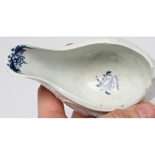 88 - A CHRISTIANS PORCELAIN SAUCE BOAT, 1768-78, smaller but similar to the previous lot and painted with... 