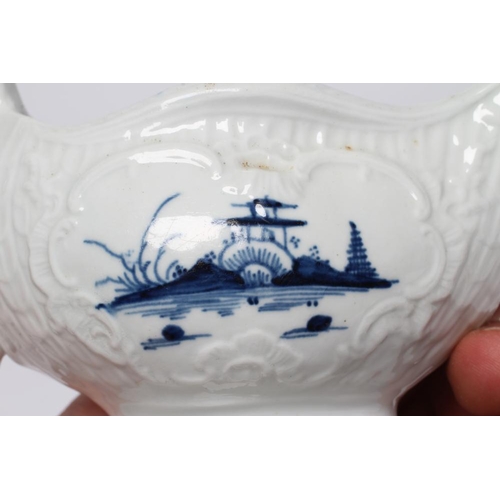 88 - A CHRISTIANS PORCELAIN SAUCE BOAT, 1768-78, smaller but similar to the previous lot and painted with... 