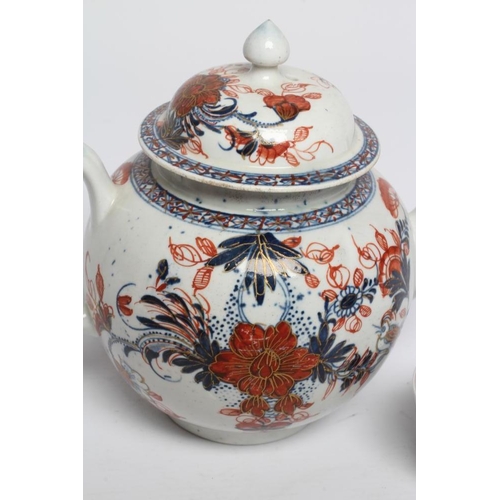 89 - A CHRISTIANS PORCELAIN TEA BOWL, 1765-68, painted in bright enamels with peony and holed rocks with ... 