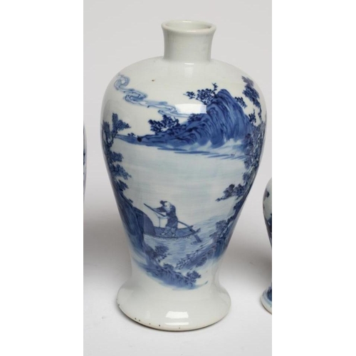 9 - THREE CHINESE PORCELAIN VASES, comprising a small pale blue glazed squat baluster vase with a salama... 