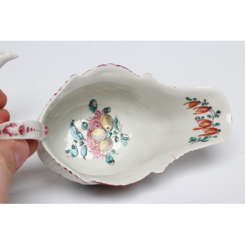 90 - A SETH PENNINGTON PORCELAIN SAUCE BOAT, 1778-90, of moulded oval form with plain lobes painted in po... 