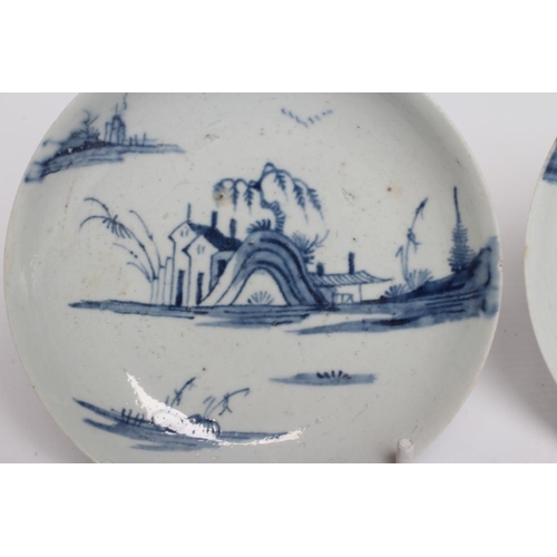 94 - A PAIR OF LIVERPOOL PORCELAIN SAUCERS, POSSIBLY WILLIAM REID, 1756-61, painted in underglaze blue wi... 