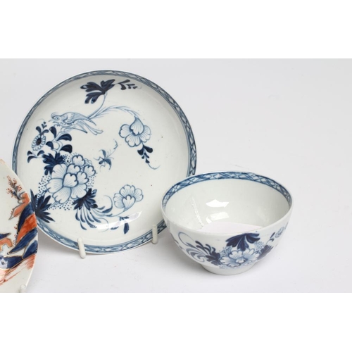 95 - A JAMES PENNINGTON PORCELAIN TEA BOWL AND SAUCER, 1765-70, painted in underglaze blue with the Bird ... 